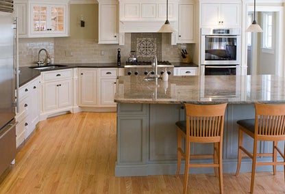 Traditional kitchen with hardwood floors and a kitchen island